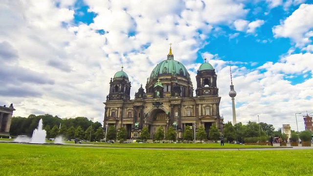Picturesque view of Berlin Cathedral (Berliner Dom) in summer day. The largest church of Berlin, Germany. Modemer Brunnen fountain on the foreground