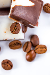Coffee cup and beans on a white background.