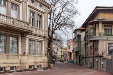 Fototapeta na wymiar PLOVDIV, BULGARIA - DECEMBER 30 2016: Houses and street in city of Plovdiv, Bulgaria