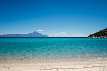 Fototapeta na wymiar Beautiful beach on the east coast of Sithonia near mountain Athos, Chalkidiki peninsula in Greece
