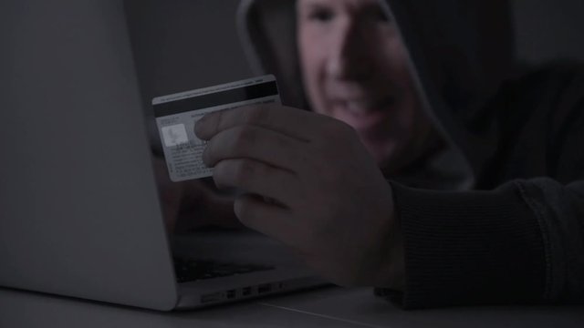 Sinister online credit card thief.