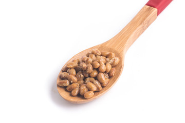 Natto. Fermented soybeans into a spoon