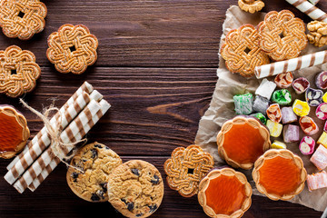 a variety of delicious cookies on the table. horizontal view from the top