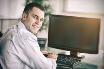 Shadowing a smiling businessman 