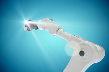 Composite image of cropped image of robotic arm holding gear 3d