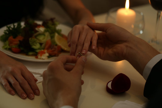 Wedding proposal in restaurant