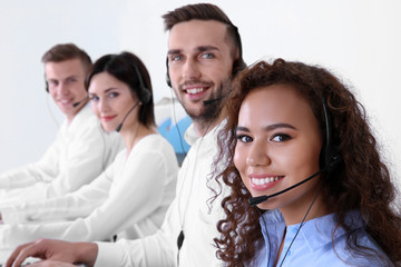 Team of technical support dispatchers working in office