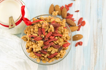 Granola muesli cereals with dried fruit in a bowl