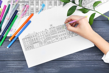 Obraz premium Woman coloring anti stress picture, closeup