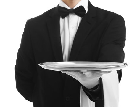 Waiter holding empty silver tray on white background