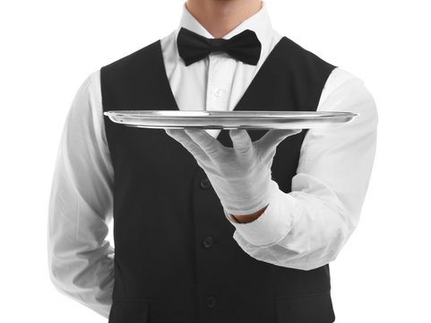 Waiter holding empty silver tray on white background