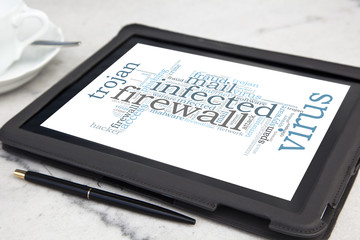 tablet with firewall word cloud