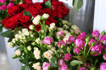 Fresh roses at floral shop, closeup