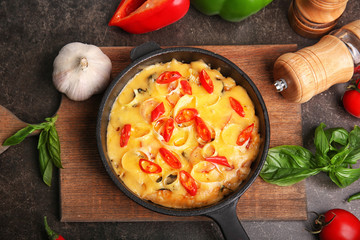 Freshly baked pizza in a pan