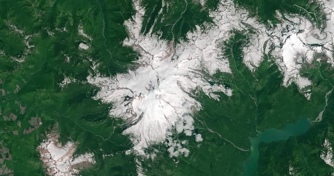 Aerial time lapse of snow drought, Mount Baker, Cascades, Washington. Two time lapse versions in clip: 8-second/4-second. 4-second head/tail pad on each version.
