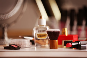 Obraz na płótnie Canvas Cosmetics on dressing table, closeup