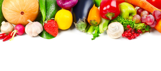 Colourful fruits and vegetables on white background