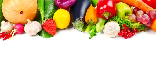 Colourful fruits and vegetables on white background