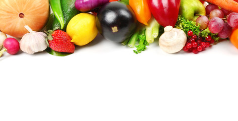 Colourful fruits and vegetables on white background