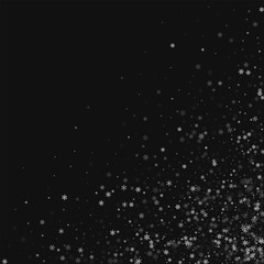 Beautiful snowfall. Scattered bottom right corner on black background. Vector illustration.