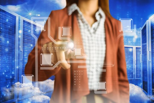 Composite image of businesswoman pointing 