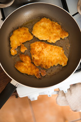fried pork chops in the pan