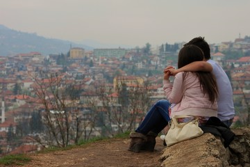 Naklejka na ściany i meble A couple looking at Sarajevo