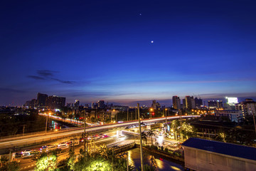 Fototapeta na wymiar Long exposure night cityscape with twilight sky background landscape