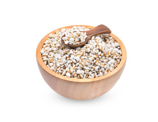 Millet rice , millet grains in wooden bowl and spoon isolated on