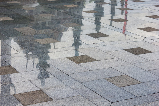 Thai temple reflection in Granite flooring surface