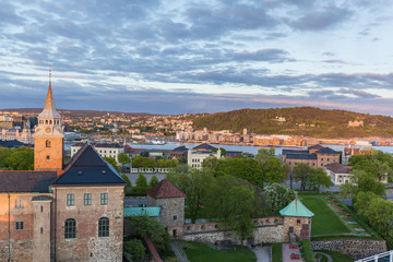 Obraz premium Akershus Fortress and city skyline in Oslo, Norway. Akershus Fortress or Akershus Castle is a medieval castle that was built to protect Oslo.