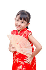 Little Asian girl in chinese traditional dress holding fan