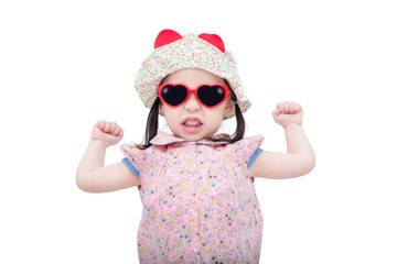 Little asian girl wearing sunglasses and hat over white backgrou