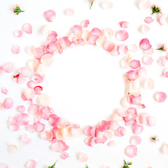 Frame made of pink roses petals on white background. Flat lay, top view. Valentine's background
