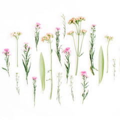 Creative wildflowers arrangement on white background. Flat lay, top view. Valentine's background