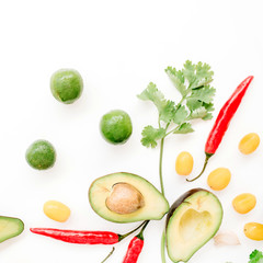 Raw food: avocado, chili pepper, coriander, cherry tomato, lime, garlic. Flat lay, top view. Food concept.