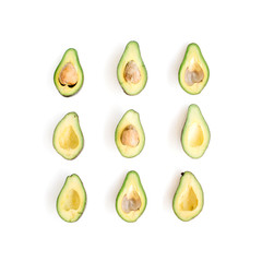 Sliced raw avocado arrangement. Flat lay, top view. Creative food concept