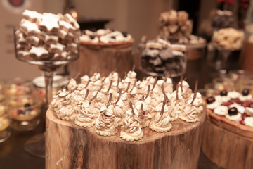 decoration of dessert on wood table in the restaurant with vinta