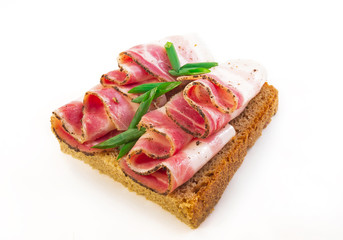 sandwich with bacon and black bread