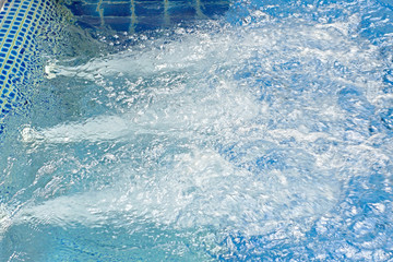 blue ripped water in jacuzzi pool - obrazy, fototapety, plakaty