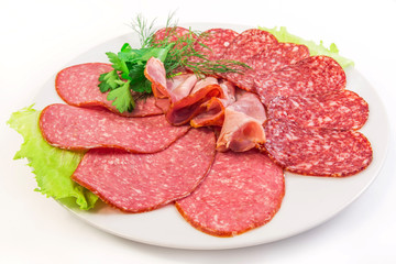 sliced sausages on the plate