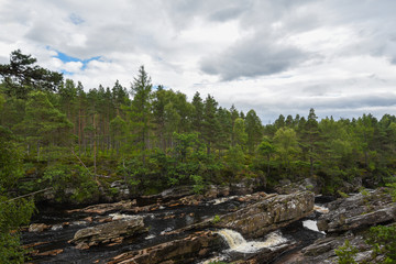 Fototapeta na wymiar Scottish River with Rocks