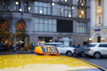 Yellow taxi cab in the city center