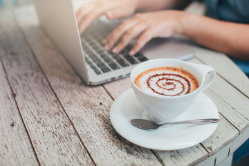 Coffee with a woman working in the coffee shop.