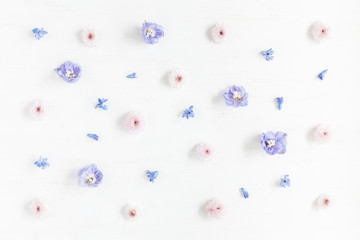 Pattern made of lilac and pink flowers. Flat lay, top view