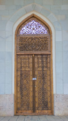Door and wall with traditional uzbek decoration in Samarkand