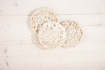 White rice waffles on wooden background