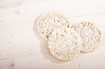 White rice waffles on wooden background