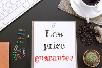 Text Low price guarantee on white paper background / business concept