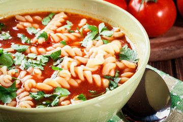 Tomato soup noodles in the bowl